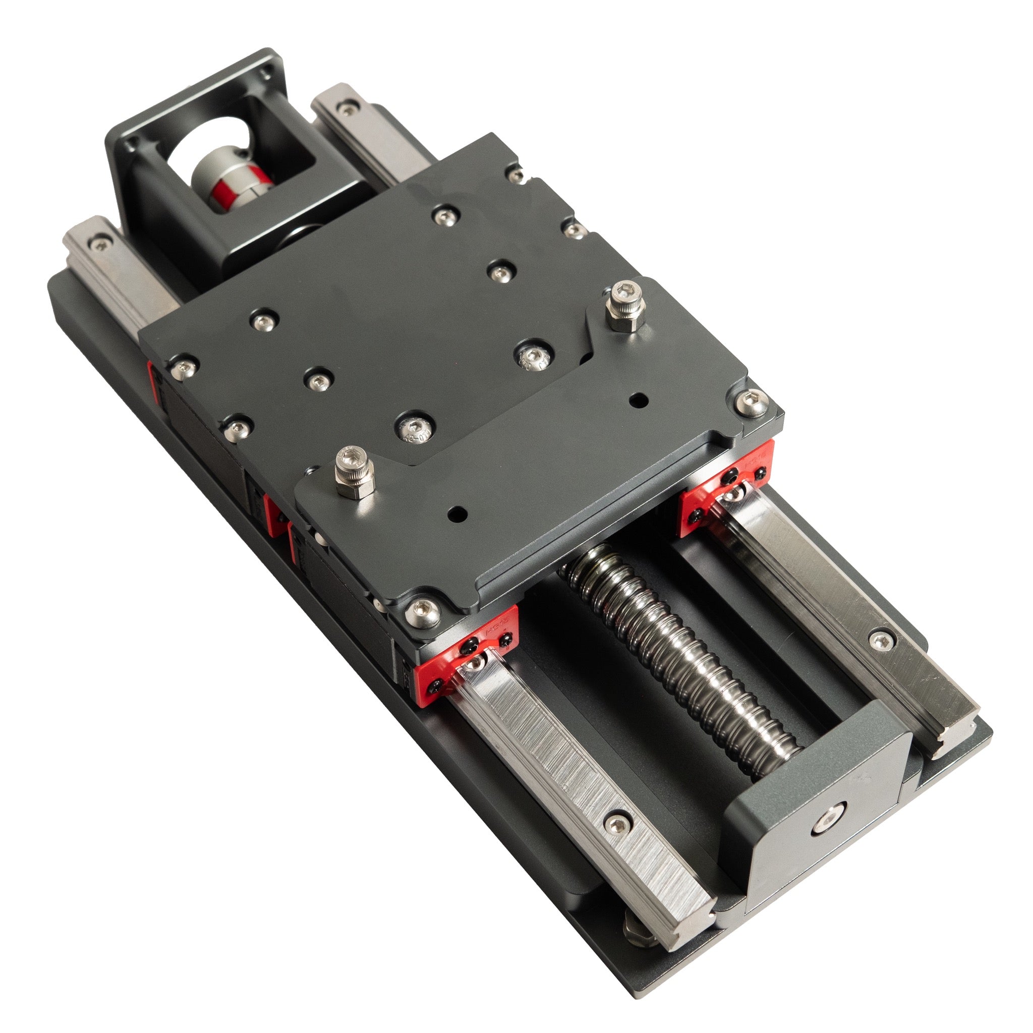 Figure 4 — A commercial heavy-duty screw-driven Z assembly (Carbide's HDZ), shown to illustrate the general form of a screw-and-linear-rail Z: a vertical screw, preloaded linear guidance, and a rig…